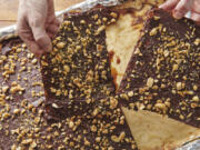 Chocolate-covered caramel matzo, also known as Matzoh Buttercrunch, has become a popular Passover dessert.