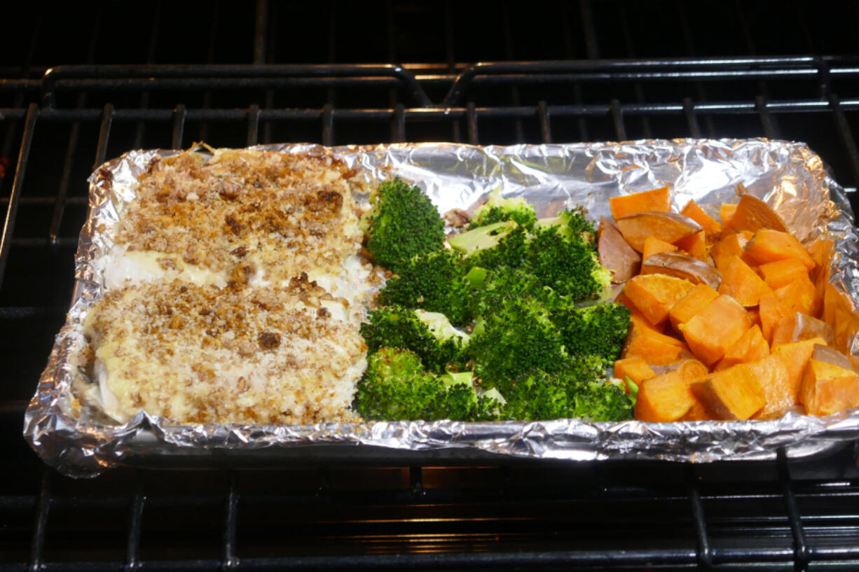 Pecan-crusted halibut, broccoli and sweet potato cubes come together quickly for a one-pan meal.