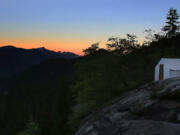 A tent is shown at dusk at a High Sierra Camp in Yosemite National Park. The park is reopening three of its five &ldquo;glamping&rdquo; campsites this summer.