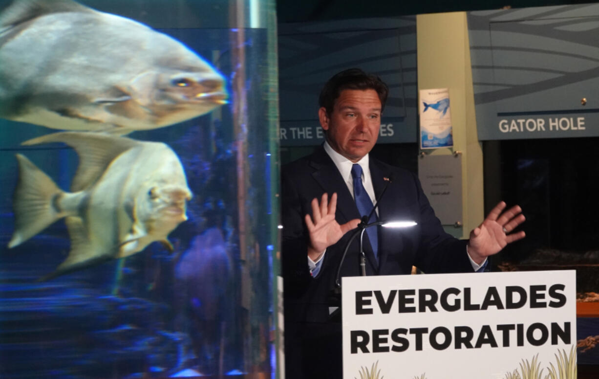 Florida Gov. Ron DeSantis speaks during a news conference at the Cox Science Center and Aquarium, Monday April 22, 2024, in West Palm Beach. He announced additional funding for environmental projects including the Florida Everglades.