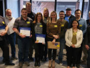 Ridgefield Lions welcomed new members March 27. Front row, left to right: new members Brian Kalbfleisch, Jason Jones, Kristy Jones, Traci Odem, Magdalena Butler and sponsor Woody Ennis.