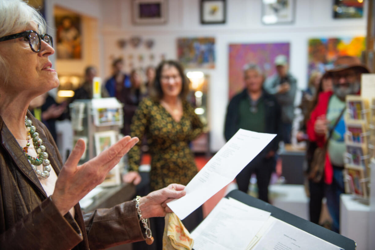 Susan Dingle, the 2024 Clark County poet laureate, recites poems at the Attic Gallery April 5 in Camas.