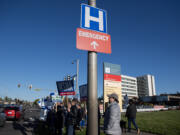 Nurses at PeaceHealth Southwest Medical Center picket outside the hospital on Thursday morning, April 18, 2024.