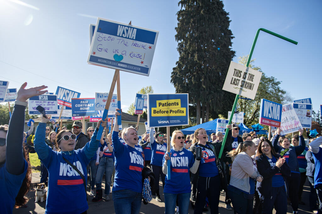 Dozens of nurses gather outside PeaceHealth Southwest Medical Center while taking part in an informational picket Thursday morning, April 18, 2024. Demonstrators, who said care was not impacted during the event, were fighting for safe staffing and fair wages.