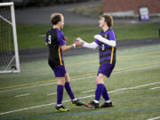 Columbia River junior Evan Roscoe (right) and Alexander Pont, shown here from an April 2024 win over R.A. Long, helped the Rapids earn a state berth Tuesday with an 8-0 district semifinal win over Tumwater.