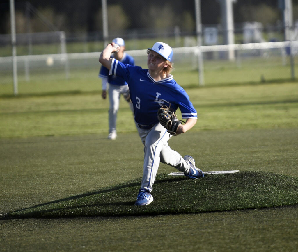 Garrett Maunu of La Center delivers a pitch in the Wildcats' 8-4 win over Seton Catholic in a Trico League baseball game at Harmony Sports Complex on Friday, April 12, 2024.