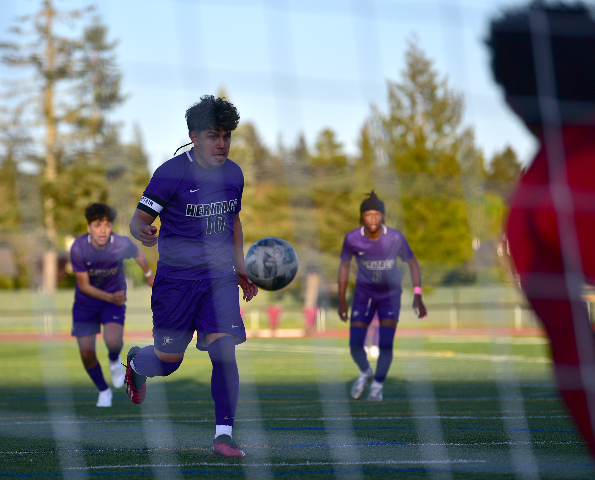 Heritage senior Pablo Sanchez-Barbosa (10) takes a penalty shot Friday, April 19, 2024, during the Timberwolves’ 3-1 win against Evergreen at Heritage High School.