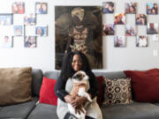 Inner Beauty in U founder Yolanda Merriweather sits with her 12-year-old dog, Ally, for a portrait on Tuesday at Merriweather&rsquo;s apartment.