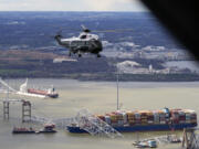 President Joe Biden, aboard Marine One, takes an aerial tour of the collapsed Francis Scott Key Bridge in Baltimore, Friday, April 5, 2024, as seen from an accompanying aircraft.