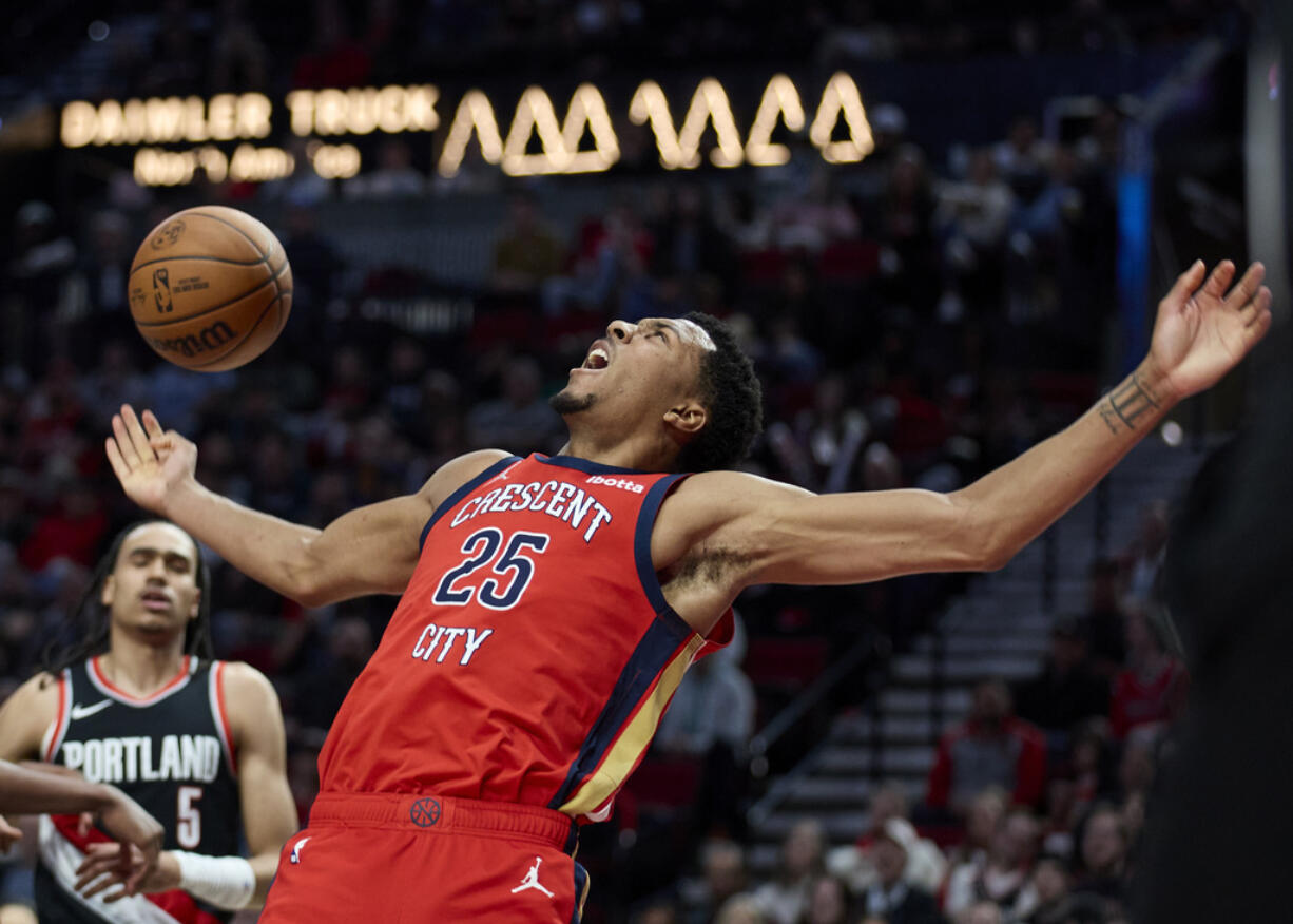 New Orleans Pelicans guard Trey Murphy III (25) reacts after scoring against the Portland Trail Blazers during the second half of an NBA basketball game in Portland, Ore., Tuesday, April 9, 2024.
