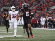 Oregon State running back Damien Martinez (6), Miami running back Henry Parrish and Pitt defensive end Jayon Hayes entered the transfer portal on Tuesday, April 16, 2024, as the 14-day spring window opened for college football players.