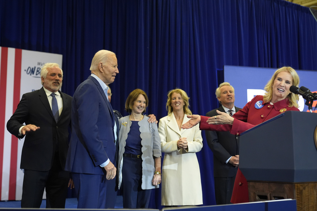 Kerry Kennedy, right, introduces President Joe Biden, second from left, at a campaign event, Thursday, April 18, 2024, in Philadelphia. Pictured from left are members of the Kennedy family Maxwell Kennedy Sr., Kathleen Kennedy Townsend, Rory Kennedy and Christopher Kennedy.