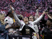 South Carolina head coach Dawn Staley celebrates after the Final Four college basketball championship game against Iowa in the women&#039;s NCAA Tournament, Sunday, April 7, 2024, in Cleveland. South Carolina won 87-75.