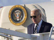 President Joe Biden boarding Air Force One at Andrews Air Force Base, Md., Friday, April 12, 2024, enroute to New Castle, Del.