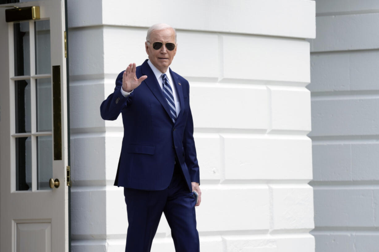 President Joe Biden waves as he walks out of the White House in Washington, Thursday, April 25, 2024, before departing on a trip to New York.