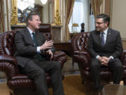 FILE - Britain&rsquo;s Foreign Secretary David Cameron, left, meets with Speaker of the House Mike Johnson, R-La., for discussions on the war in Ukraine, at the Capitol in Washington, Wednesday, Dec. 6, 2023. British Foreign Secretary David Cameron is expected to urge U.S. lawmakers to approve a new package of aid for Ukraine when he visits Washington this week, warning Congress that it is putting the security of the West at risk by continuing to hold up the funding. (AP Photo/J.