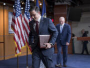 Speaker of the House Mike Johnson, R-La., departs after he and the House Republican leadership met with reporters following a closed-door Republican strategy session as Johnson pushes towards separate votes on aid for Israel and Ukraine, at the Capitol in Washington, Tuesday, April 16, 2024. (AP Photo/J.