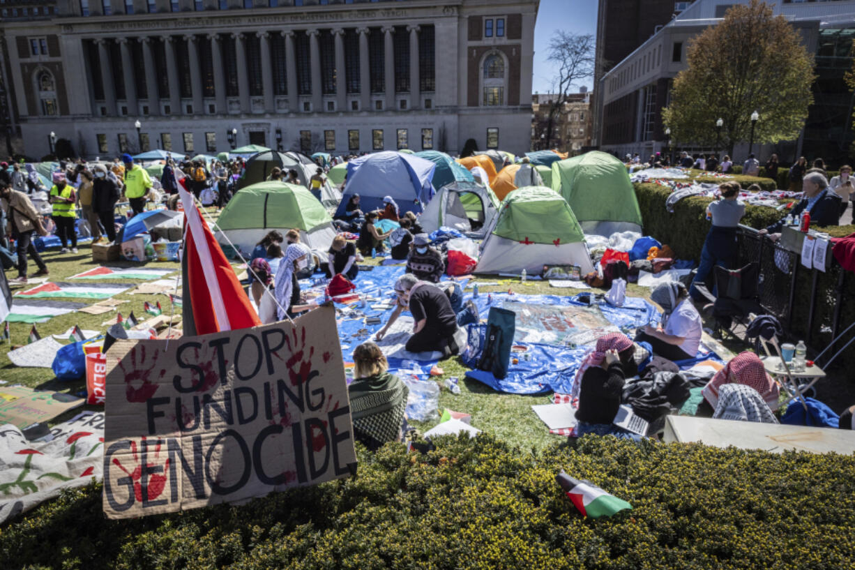 A sign sits erected at the pro-Palestinian demonstration encampment at Columbia University in New York, Monday, April 22, 2024. U.S. colleges and universities are preparing for end-of-year commencement ceremonies with a unique challenge: providing safety for graduates while honoring the free speech rights of students involved in protests over the Israel-Hamas war.