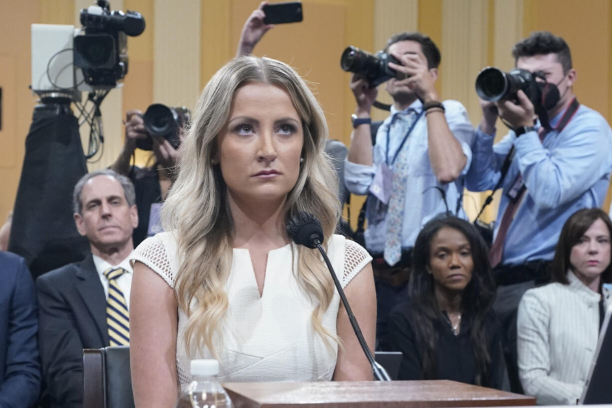 FILE - Sarah Matthews, former White House deputy press secretary, arrives as the House select committee investigating the Jan. 6 attack on the U.S. Capitol holds a hearing at the Capitol in Washington, July 21, 2022. As Donald Trump seeks the presidency for a third time, he is being vigorously opposed by a vocal contingent of former officials who are stridently warning against his return to power and offering dire predictions for the country and the rule of law if his campaign succeeds.