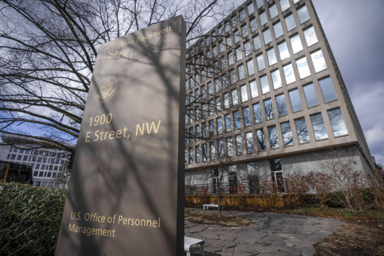 FILE - The Theodore Roosevelt Building, location of the U.S. Office of Personnel Management, on Feb. 13, 2024, in Washington. The government&rsquo;s chief human resources agency has issued a new rule making it harder to fire thousands of federal employees. Advocates hope the rule will head off former President Donald Trump&rsquo;s promises to radically remake the workforce along ideological lines if he wins back the White House in November.