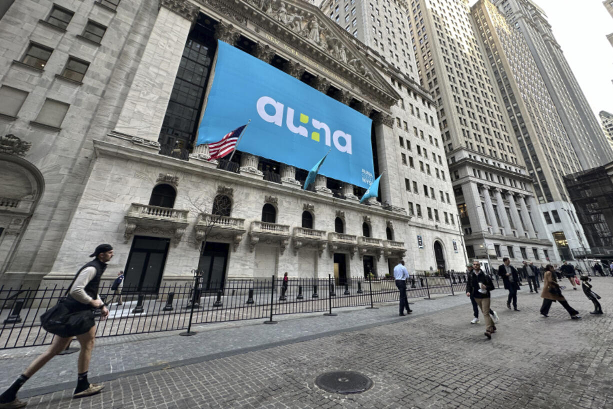 People walk past the New York Stock Exchange Wednesday, April 10, 2024 in New York. Wall Street marched higher ahead of the government&rsquo;s update on U.S. inflation which could play into the Federal Reserve&rsquo;s next interest rate decision.