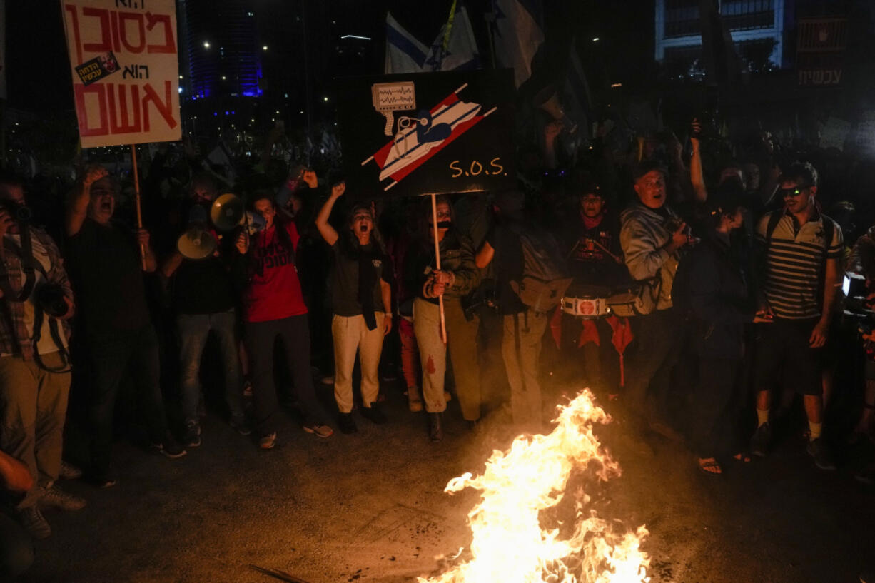 People protest against Israeli Prime Minister Benjamin Netanyahu&rsquo;s government and call for the release of hostages held in the Gaza Strip by the Hamas militant group in Tel Aviv, Israel, Saturday, April 6, 2024.