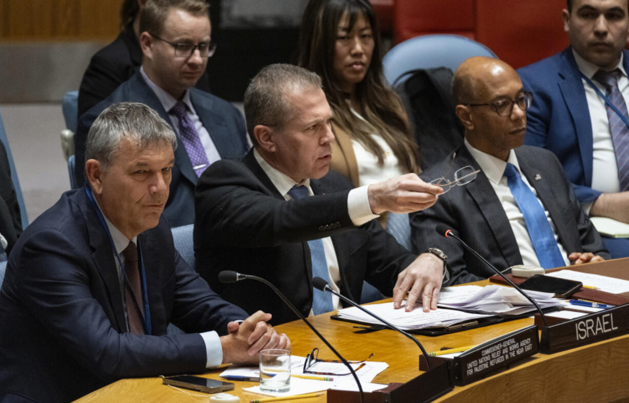 Israel&rsquo;s U.N. Ambassador Gilad Erdan, center, addresses members of the United Nations Security Council at U.N. Headquarters Wednesday, April 17, 2024. Commissioner-General of the U.N. Relief and Works Agency for Palestine Refugees, Philippe Lazzarini is at left, Robert A. Wood, United States Ambassador to the United Nations is at right.