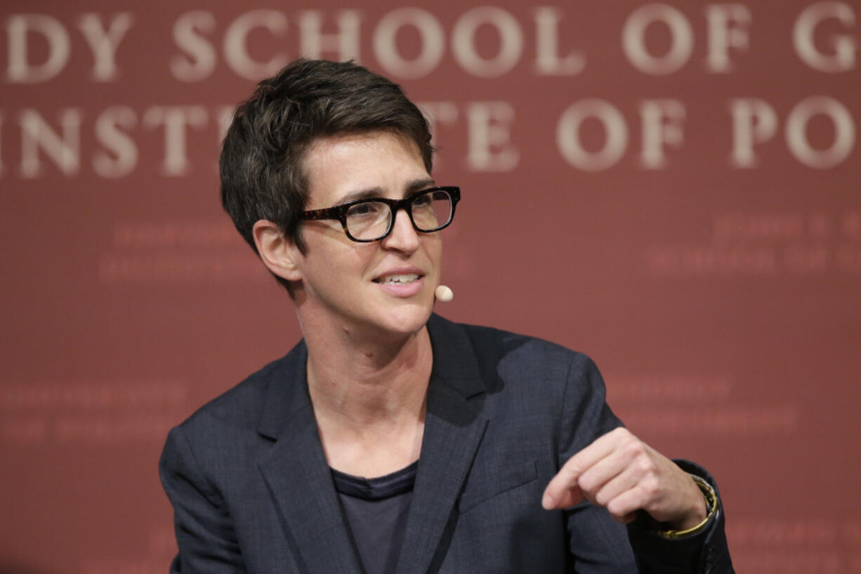 FILE - MSNBC television anchor Rachel Maddow, host of &ldquo;The Rachel Maddow Show,&rdquo; moderates a panel at the John F. Kennedy School of Government, at Harvard University, in Cambridge, Mass., on Oct. 16, 2017. In the past few weeks, NBC reversed a decision to hire former Republican National Committee head Ronna McDaniel as a political contributor following a revolt by some of its best-known personalities, including Maddow, and others.