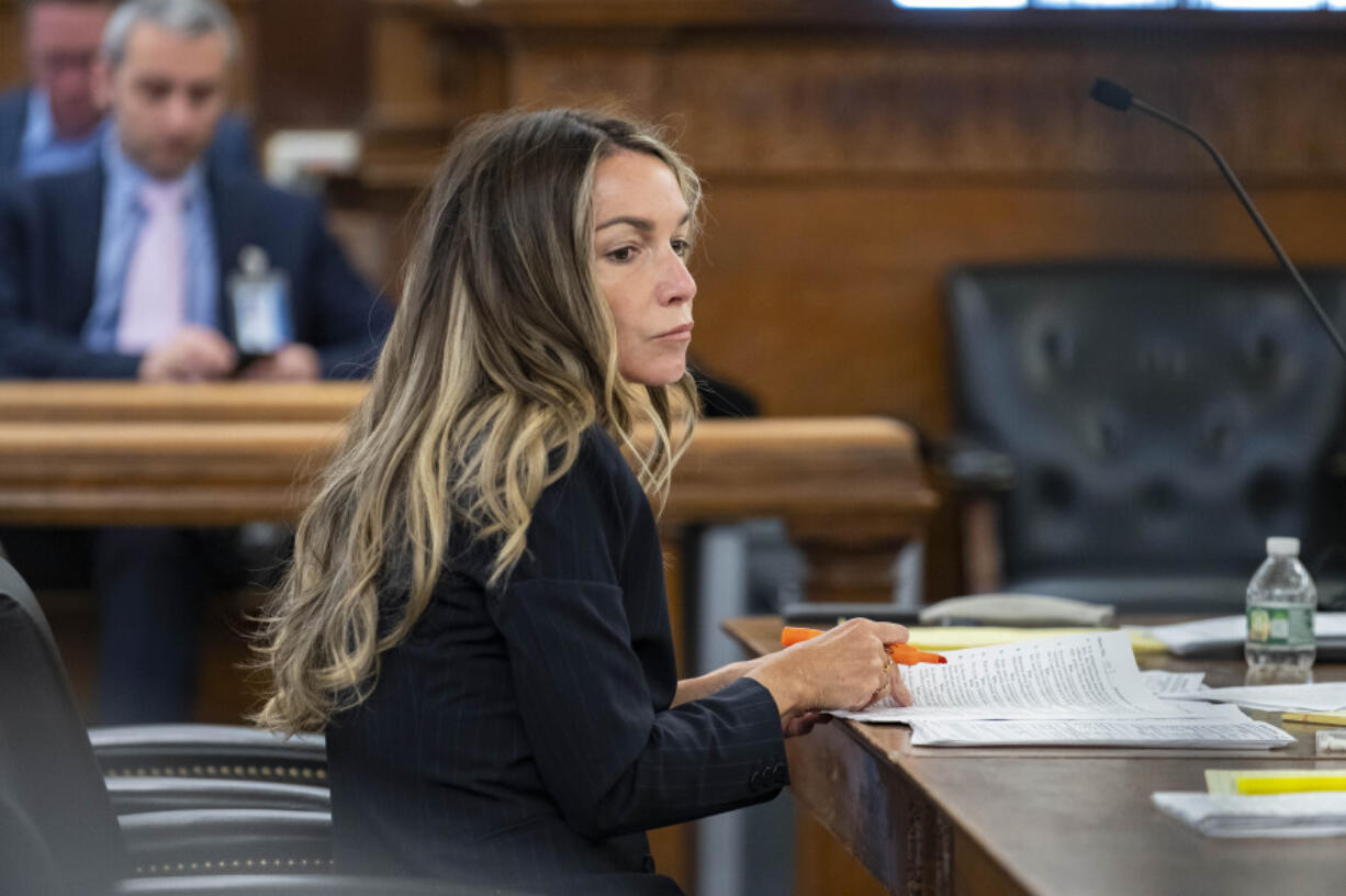 Karen Read sits in court during jury selection at Norfolk County Superior Court, Wednesday, April 17, 2024, in Dedham, Mass. Read, 44, is accused of running into her Boston police officer boyfriend with her SUV in the middle of a nor&rsquo;easter and leaving him for dead after a night of heavy drinking.