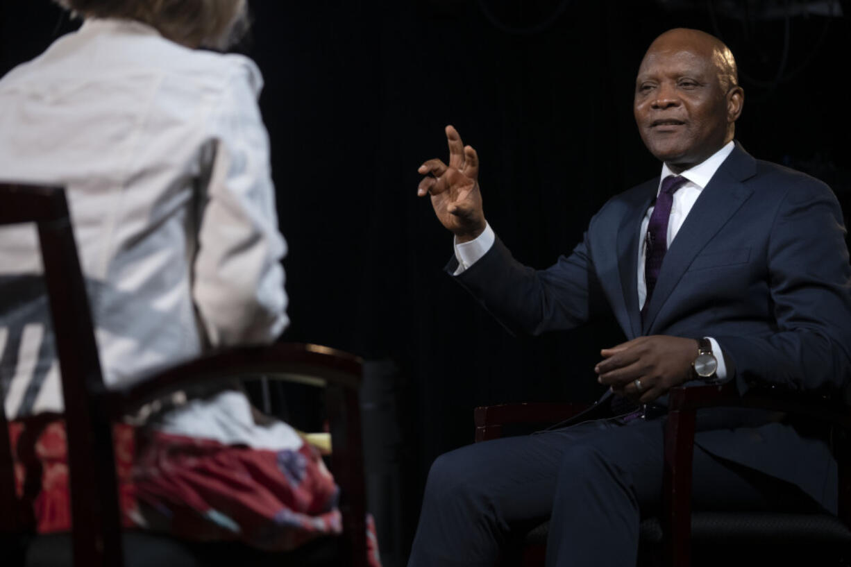 FILE - John Nkengasong, head of the U.S. President&rsquo;s Emergency Plan for AIDS Relief (PEPFAR), speaks during an interview on Aug. 29, 2023, in Washington. Nkengasong spoke to The Associated Press about his experience, at a period when challenges by anti-abortion groups and House Republican have made the future of PEPFAR uncertain.