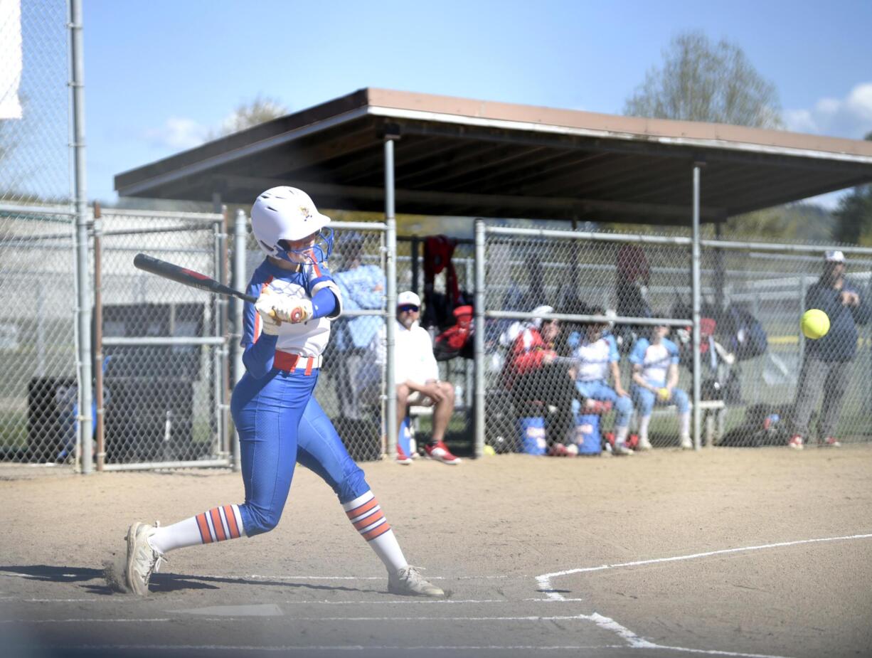 Ridgefield's Mallory Vancleave swings at a pitch during a 2A GSHL softball game against Mark Morris on Wednesday, April 17, 2024, in Longview.