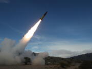 FILE - In this image provided by the U.S. Army, soldiers, from the 3rd Battalion, 321st Field Artillery Regiment of the 18th Field Artillery Brigade out of Fort Bragg N.C., conduct live fire testing at White Sands Missile Range, N.M., on Dec. 14, 2021, of early versions of the Army Tactical Missile System.  U.S. officials say Ukraine for the first time has begun using long-range ballistic missiles, striking a Russian military airfield in Crimea and Russian troops in another occupied area overnight. The strikes come about a month after the U.S. secretly provided the weapons so that Ukraine could strike targets up to 190 miles away. (John Hamilton/U.S.