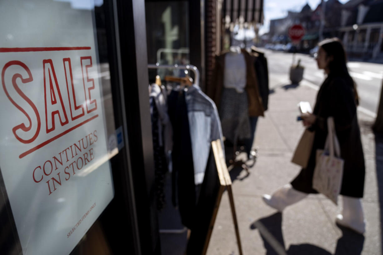 FILE - A shop holds a sidewalk sale on Feb. 10, 2023, in Providence, R.I.