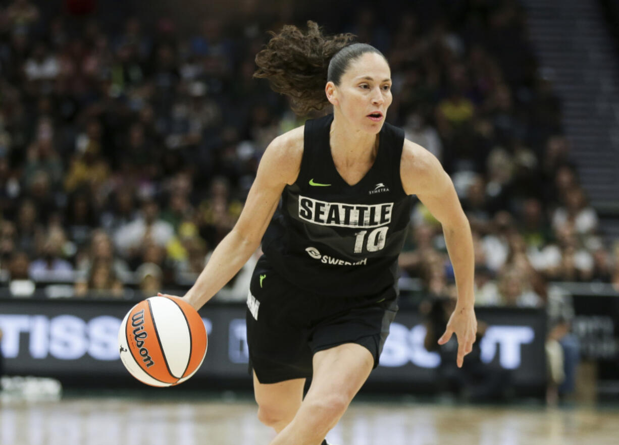 FILE - Seattle Storm guard Sue Bird brings the ball up against the Washington Mystics during the second half of Game 1 of a WNBA basketball first-round playoff series Aug. 18, 2022, in Seattle. The Storm&rsquo;s owners, Force 10 Hoops, said Wednesday, April 24, 2024, that Bird has joined the ownership group. Bird said in a team statement her involvement with the Storm will continue to grow the game. &ldquo;Investing in women&rsquo;s sports isn&rsquo;t just about passion,&rdquo; she said.