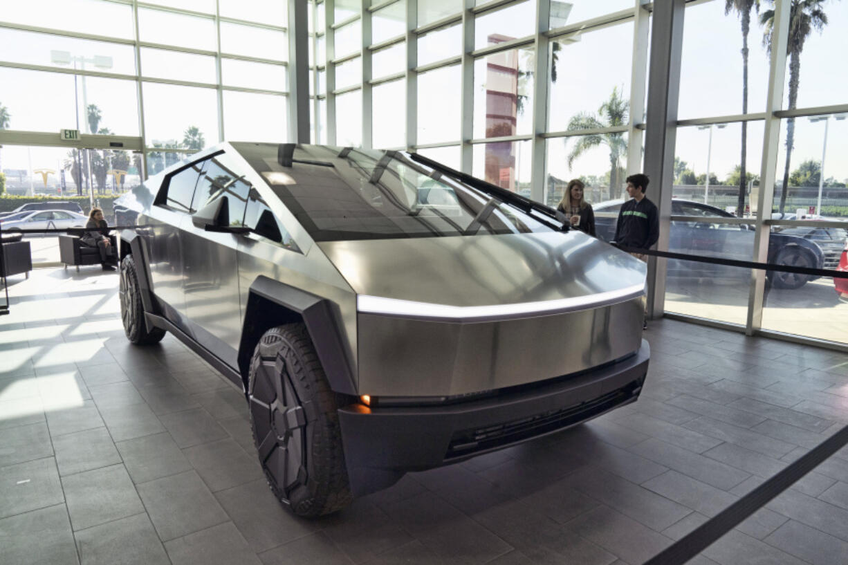 A Tesla Cybertruck is on display at the Tesla showroom in Buena Park, Calif. on Sunday Dec. 3, 2023. Tesla is recalling 3,878 of its 2024 Cybertrucks after it discovered that the accelerator pedal can become stuck, potentially causing the vehicle to accelerate unintentionally and increasing the risk of a crash.