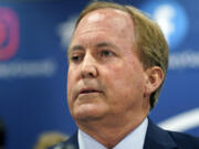 FILE - Texas Attorney General Ken Paxton makes a statement at his office, May 26, 2023, in Austin, Texas. Paxton is dropping a request for a Seattle hospital to hand over records regarding gender-affirming treatment potentially given to children from Texas as part of a lawsuit settlement announced Monday, April 22, 2024.