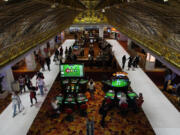 People walk through the casino floor at the Tropicana hotel-casino Friday, March 29, 2024, in Las Vegas. The property is scheduled to close April 2, 2024.