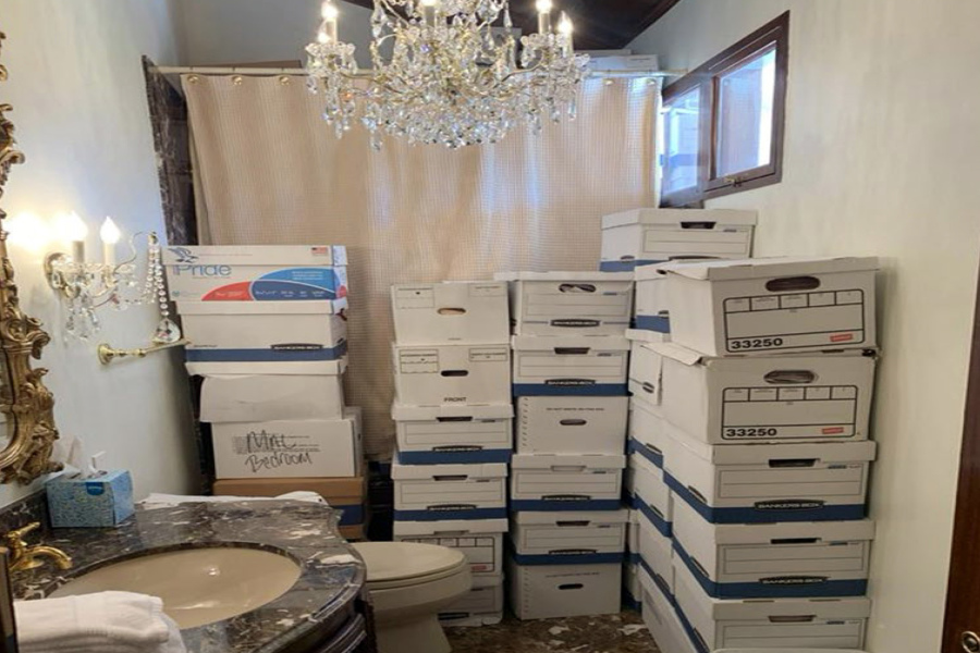 This image, contained in the indictment against former President Donald Trump, shows boxes of records stored in a bathroom and shower in the Lake Room at Trump&#039;s Mar-a-Lago estate in Palm Beach, Fla. The classified documents investigation of Donald Trump appeared to have clear momentum in 2022 when FBI agents who searched the former president&rsquo;s Mar-a-Lago estate recovered dozens of boxes containing sensitive documents. But each passing day brings mounting doubts that the case can reach trial this year. The judge has yet to set a firm trial date despite holding two hours-long hearings with lawyers this month.