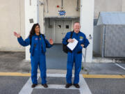 NASA astronauts Sunita “Suni” Williams and Barry “Butch” Wilmore emerge from the Neil Armstrong Operations and Checkout Building at the agency’s Kennedy Space Center in Florida on Wednesday, Jan. 31, 2024, as part of an integrated crew exercise simulation for NASA’s Boeing Crew Flight Test.