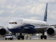 FILE - Boeing employees walk the new Boeing 787-10 Dreamliner down towards the delivery ramp area at the company&rsquo;s facility after conducting its first test flight at Charleston International Airport, Friday, March 31, 2017, in North Charleston, S.C. A Senate subcommittee has opened an investigation into the safety of Boeing jetliners, intensifying safety concerns about the company&rsquo;s aircraft. The panel has summoned Boeing&rsquo;s CEO, Dave Calhoun, to a hearing next week where a company engineer, Sam Salehpour, is expected to detail safety concerns about the manufacture and assembly of Boeing&rsquo;s 787 Dreamliner.