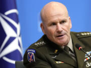 FILE -  Supreme Allied Commander Europe, Gen. Christopher Cavoli addresses a media conference at NATO headquarters in Brussels, Jan. 18, 2024.  Cavoli told Congress Wednesday that Ukraine will be outgunned 10 to one by Russia within a matter of weeks if Congress does not find a way to approve sending more ammunition and weapons to Kyiv soon.