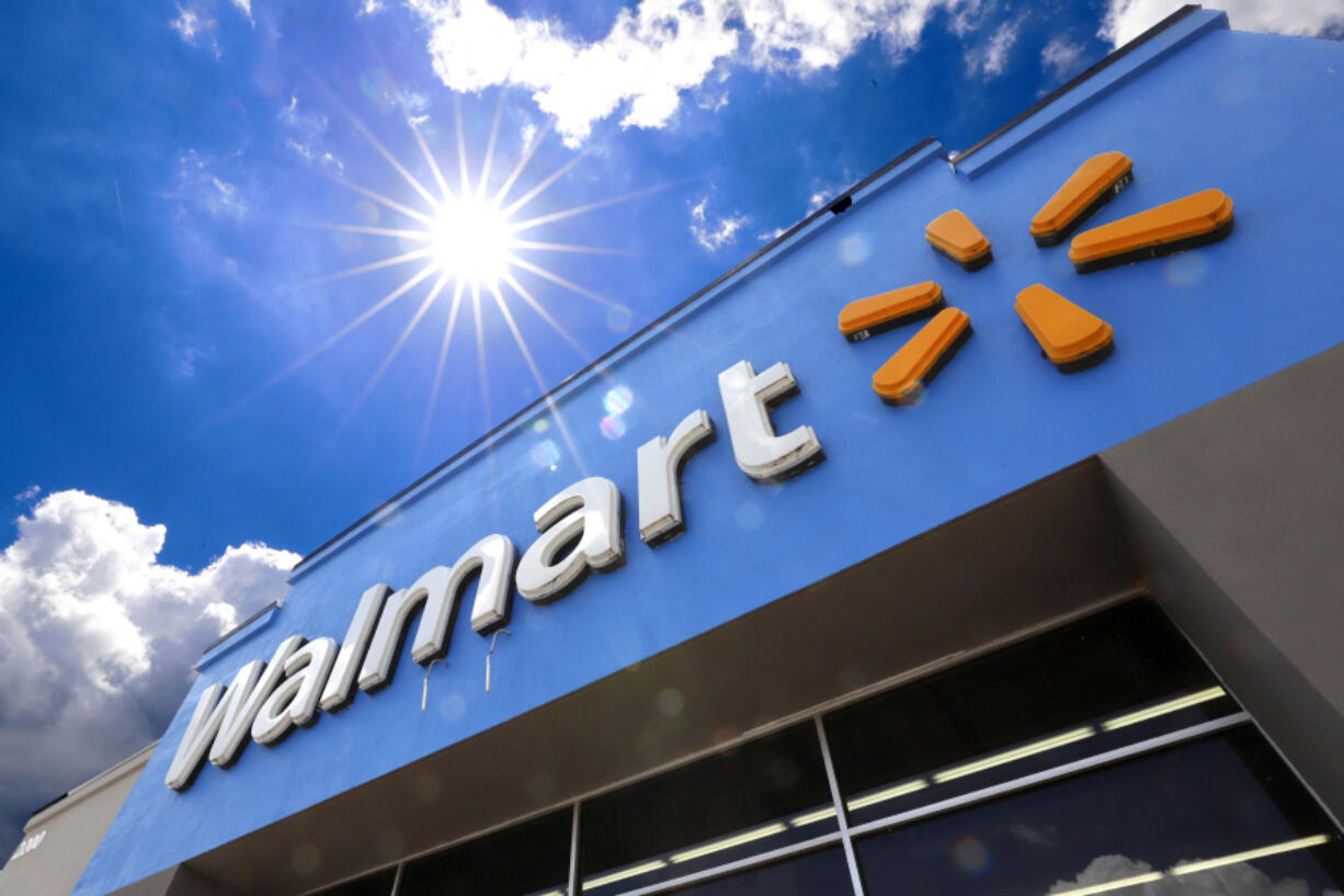 FILE - A Walmart sign is displayed over the entrance to a store, June 25, 2019, in Pittsburgh. Walmart said Tuesday, April 30, 2024, that it is launching its biggest store-label food brand in 20 years in terms of its breadth of items, as it seeks to appeal to younger customers who are not brand loyal and want chef-inspired foods that are more affordably priced. (AP Photo/Gene J.