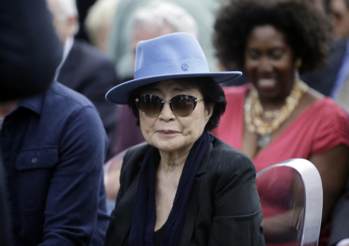 FILE - Yoko Ono appears before the dedication ceremony for her permanent art installation, a sculpture called SKYLANDING, at Jackson Park, Oct. 17, 2016, in Chicago. One of the country&rsquo;s leading artist residency programs, MacDowell, has awarded a lifetime achievement prize to Ono. The groundbreaking artist, filmmaker and musician is the 2024 recipient of the Edward MacDowell Medal, an honor previously given to Stephen Sondheim and Toni Morrison among others.