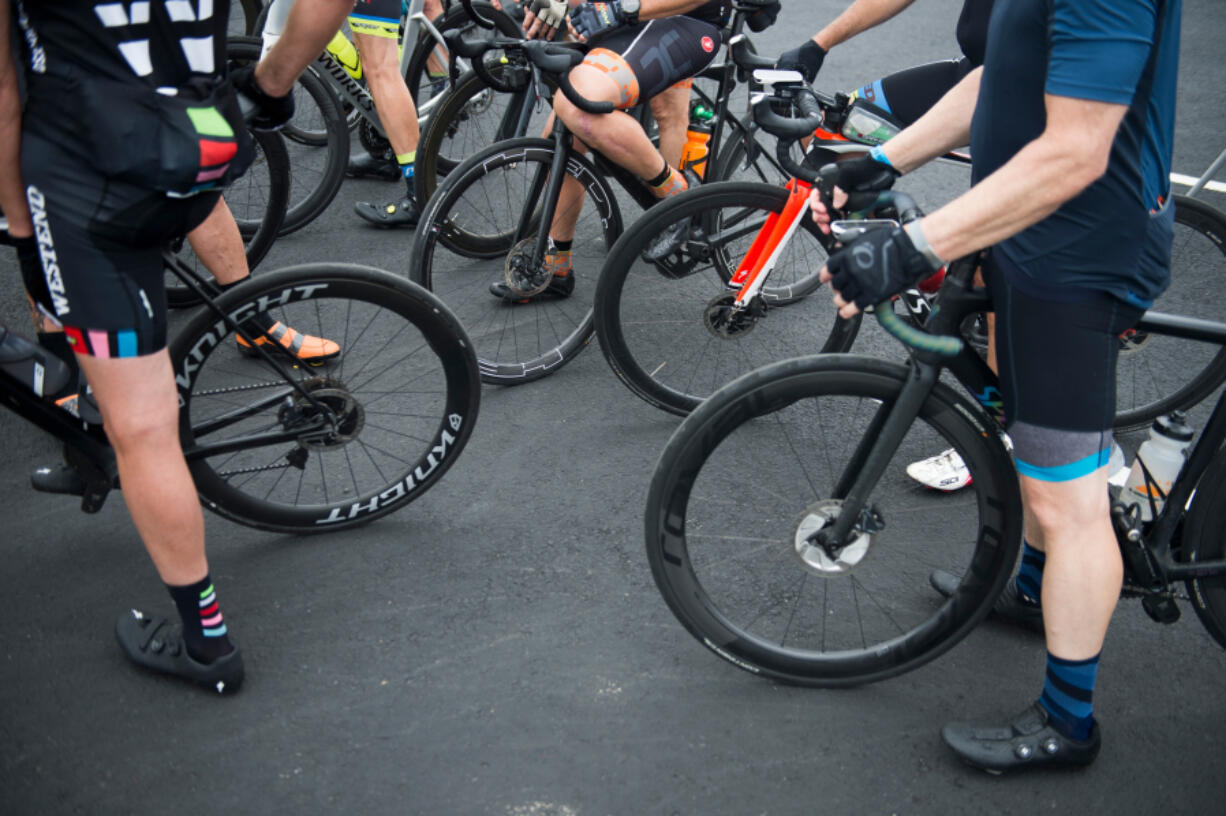 Bikers take a break from the 100-mile Ride Around Clark County loop at the Clark County Fire &amp; Rescue Station 24 in Ridgefield in 2019.