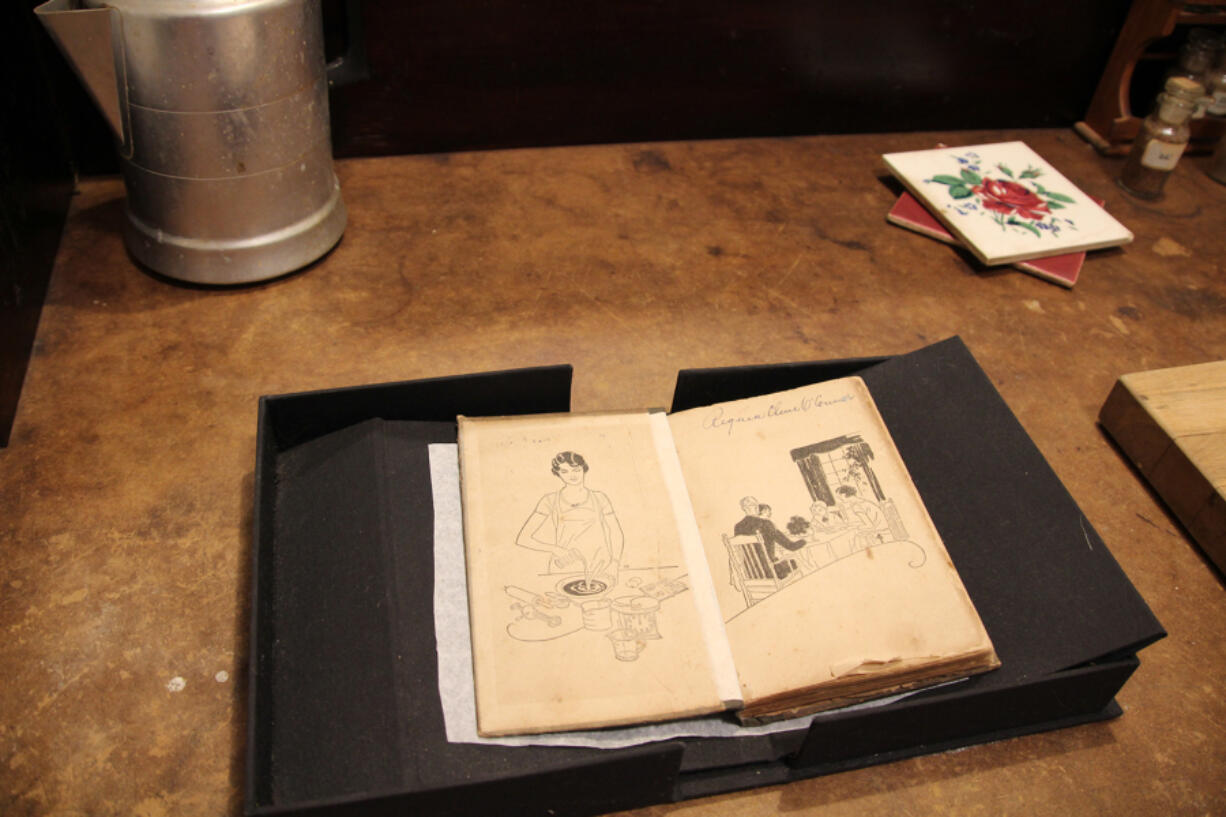 About 90% of the artifacts are original at Andalusia Farm, once home to Flannery O&Ccedil;&fnof;&Ugrave;Connor, the purported queen of Southern Gothic. Shown here is the cookbook of Regina Cline O&Ccedil;&fnof;&Ugrave;Connor, Flannery O&Ccedil;&fnof;&Ugrave;Connor&Ccedil;&fnof;&Ugrave;s mother.