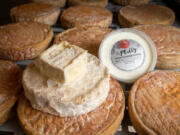 Perrystead Dairy specializes in creamy, spreadable cheeses best served at room temperature. Pictured are a selection of its cheeses, including Intergalactic, Field Day, a container of the Real Philly Schmear, and an experimental cheese. Perry says such experiments may appear in the dairy&rsquo;s new cheese dispensary. (Alejandro A.