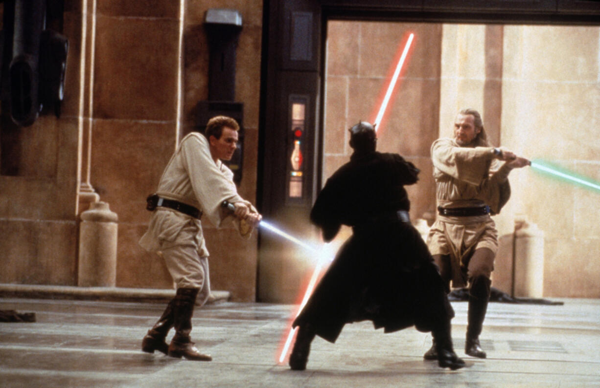 From left: Obi-Wan Kenobi (Ewan McGregor), Darth Maul (Ray Park) and Qui-Gon Jinn (Liam Neeson) in the climactic lightsaber duel of &ldquo;Star Wars: Episode I &mdash; The Phantom Menace.&rdquo; (Photos by Keith Hamshere/Lucasfilm Ltd.)