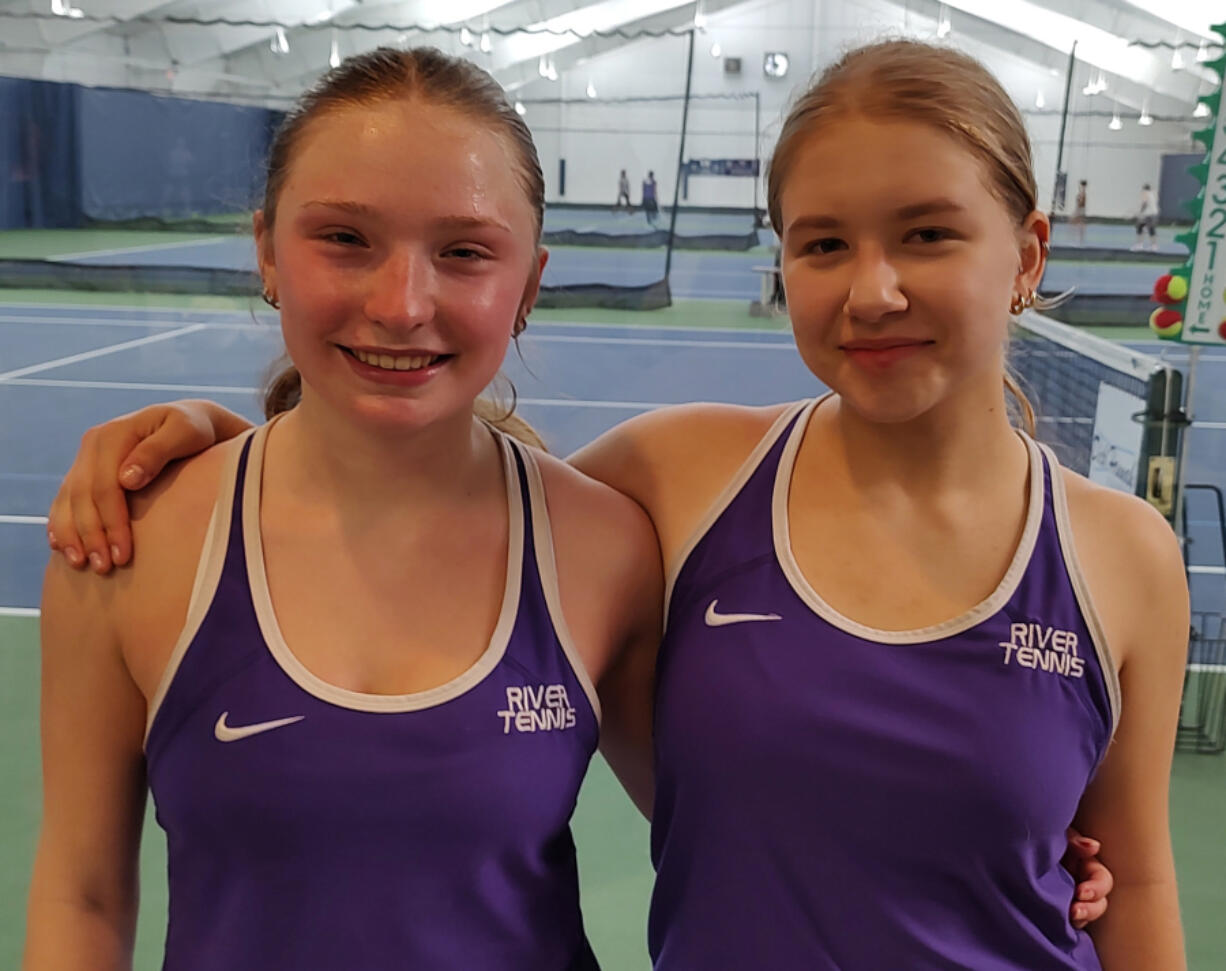 Columbia River junior Emma Lungwitz, left, and Columbia River freshman Jenny Serebriakova at Vancouver Tennis Center on Thursday, May 16, 2024. Serebriakova beat Lungwitz for the 2A bi-district singles title 7-6 (4), 6-3.