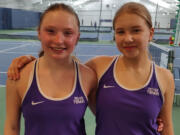 Columbia River junior Emma Lungwitz, left, and Columbia River freshman Jenny Serebriakova at Vancouver Tennis Center on Thursday, May 16, 2024. Serebriakova beat Lungwitz for the 2A bi-district singles title 7-6 (4), 6-3.