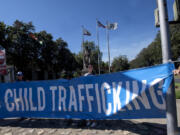 The effort to &Ccedil;&fnof;&uacute;end child trafficking&Ccedil;&fnof;&ugrave; was big and bold surrounding the Madonna of the Trail statue in Upland, California, on July 30, 2020.